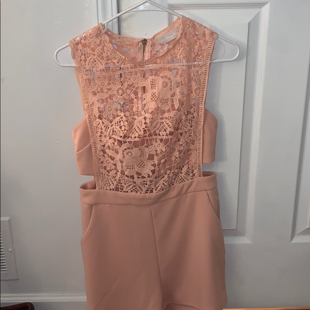 Romper never worn, no tags just does not fit